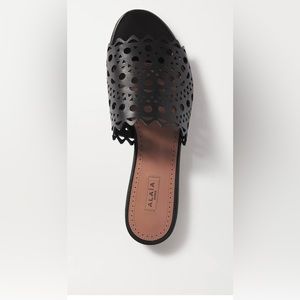 New Alaïa
Lasercut Leather Slide Sandals